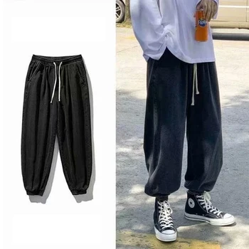 Muške traperice hlače-teretni hip - hop Slobodne ženske sportske hlače s uzorkom Muške crne hlače Prevelike traperice od денима Korejski traperice s remenčićima na gležnjevima